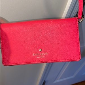 Kate spade bright pink crossbody mini purse.